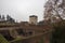 View of medieval tower and walls of Medici Fortress of Santa Barbara. Pistoia. Tuscany. Italy.