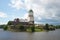 View of the medieval Vyborg Castle in the cloudy August afternoon, Russia