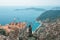 View on the Mediterranean Sea over the roofs of the picturesque medieval village of Eze with the Saint-Jean-Cap-Ferrat peninsula