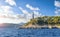 View from the Mediterranean Sea of the Saint Jean Cap Ferrat lighthouse as the sun begins to set on the French Riviera