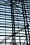 A view of the metal structures of the windows of the airport waiting room.