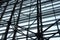 A view of the metal structures of the windows of the airport waiting room.