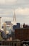 View of Midtown Manhattan and lower east side from the walkway on the Brooklyn Bridge