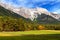 View of Mieminger Plateau with high mountain range in the background, Austrian landscape, Tyrol