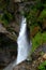 View of the mighty Rychenbachfall waterfall in a mountain gorge near Meiringen, Switzerland