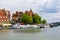 View from MikoÅ‚ajskie Lake of town, marina for yachts and boats at the waterfront, Mikolajki, Masuria, Poland