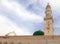 View of minaret and green dome of Nabawi Mosque, is the second holiest mosque in Islam