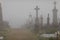 View of the misty graveyard. Lowyat cemetery, city of Limoges, France