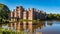 View of a moated brick castle