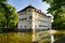View of the Moated Castle surrounded with trees in the City of Bad Rappenau in Germany