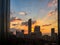 View of modern buildings and towers at a cloudy sunset, Abu Dhabi city