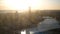 View of the modern city in the rays of the setting sun. Stock footage. Spectacular views of the city in the summer sun