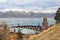 View of the modern monastery built on a peninsula near Lake Sevan overlooking the snow-capped mountains. Armenia