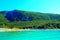 View from Molo Portonovo at the Adriatic Sea with waters, beach, equipment