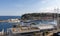 View of Monte-Carlo marina, Monaco in spring with yachts and sailing ships and the palace