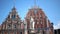 View of a monument to Roland at Town Hall Square against the background House of the Blackheads of Riga Latvia