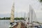 View moored yachts in harbor near marina.