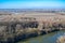 View of the Morava river in the autumn forests near the city of Bratislava