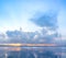 A view of the morning lake with cloudy clouds moving over the lake.001