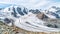 View for Morteratsch Glacier and panorama of Piz Berinia and Piz Palu in Switzerland.