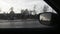 View on Moscow City. Drops from the rain on the glass of a car, the urban landscape in defocusing, rearview mirror. Background