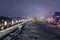 View of Moscow Kremlin and Bolshoy Kamenny Bridge from Patriarshy Bridge at night in winter. Moscow. Russia