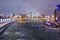 View of Moscow Kremlin and Bolshoy Kamenny Bridge from Patriarshy Bridge at night in winter. Moscow. Russia