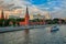 View of the Moscow Kremlin from the Moscow river. Red brick towers and Bell Tower Of Ivan The Great. Grand Kremlin palace