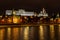 View of Moscow Kremlin with reflection of night illumination on surface of Moskva river