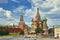 View on Moscow Red Square, Kremlin towers, stars and Clock Kuranti, Saint Basil`s Cathedral church. Hotel Russia Moscow Red Square