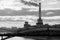 View on Moscow river. Rostovskay embankment. Bridge, factory. Black and white photo.