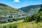 View on Mosel river, hills with vineyards old town Zell, Germany