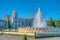 View of mosteiro dos Jeronimos through praca do imperio in Belem, Lisbon, Portugal