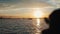 View from the motor boat. Fishermen on a sailboat go to sea early in the morning in Africa.