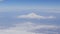 View of Mount Ararat from an airplane. Snow-capped mountain top. Biblical mount Ararat taken from the Airplane