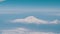 View of Mount Ararat from an airplane. Snow-capped mountain top. Biblical mount Ararat taken from the Airplane