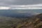 The view from Mount Batur in Kintamani Hardened lava at the foot of the volcano Batur. Big sharp volcanic stones in the foreground