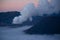 View of the Mount Bromo at sunrise over blanket clouds, active volcano in East Java, Indonesia.