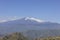 View of Mount Etna volcano from path of Saracens in mountains between Taormina and Castelmola, Sicily Italy