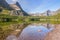 View of Mount Grinnell across Redrock Lake in the Many Glacier A