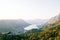 View from Mount Lovcen to the Bay of Kotor surrounded by a mountain range in a light haze. Montenegro