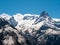 View from Mount Mussa-Achitara to the snow-capped Caucasus mountains. Dombai, Karachay-Cherkess Republic, Russia