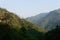 The view of mountain, blue sky, greenery, the beauty of nature of the famous neer waterfall, rishikesh, Uttarakhand, India