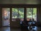 View of the mountain forest from the window of the cottage of the mountain village. Use of the hotel business in mountain tourism