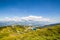 View from mountain Gasselhoehe to lake and distant mountain Dachstein