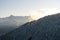 View of the mountain Kitzsteinhorn in winter with trees in the foreground. View from Keilberg, SchmittenhÃ¶he, Zell am See,