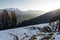 View of the mountain Kitzsteinhorn in winter with trees. View from Keilberg, SchmittenhÃ¶he, Zell am See, Austria.