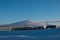 View of the mountain Loussavaara and iron ore trains from the mine on a sunny winter day. Kiruna in Swedish Lapland.