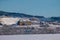 View of the mountain Loussavaara and the newly built housing next to it on a sunny winter day. Kiruna in Swedish Lapland