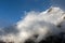 View of Mountain Peak and massive Cloud Front